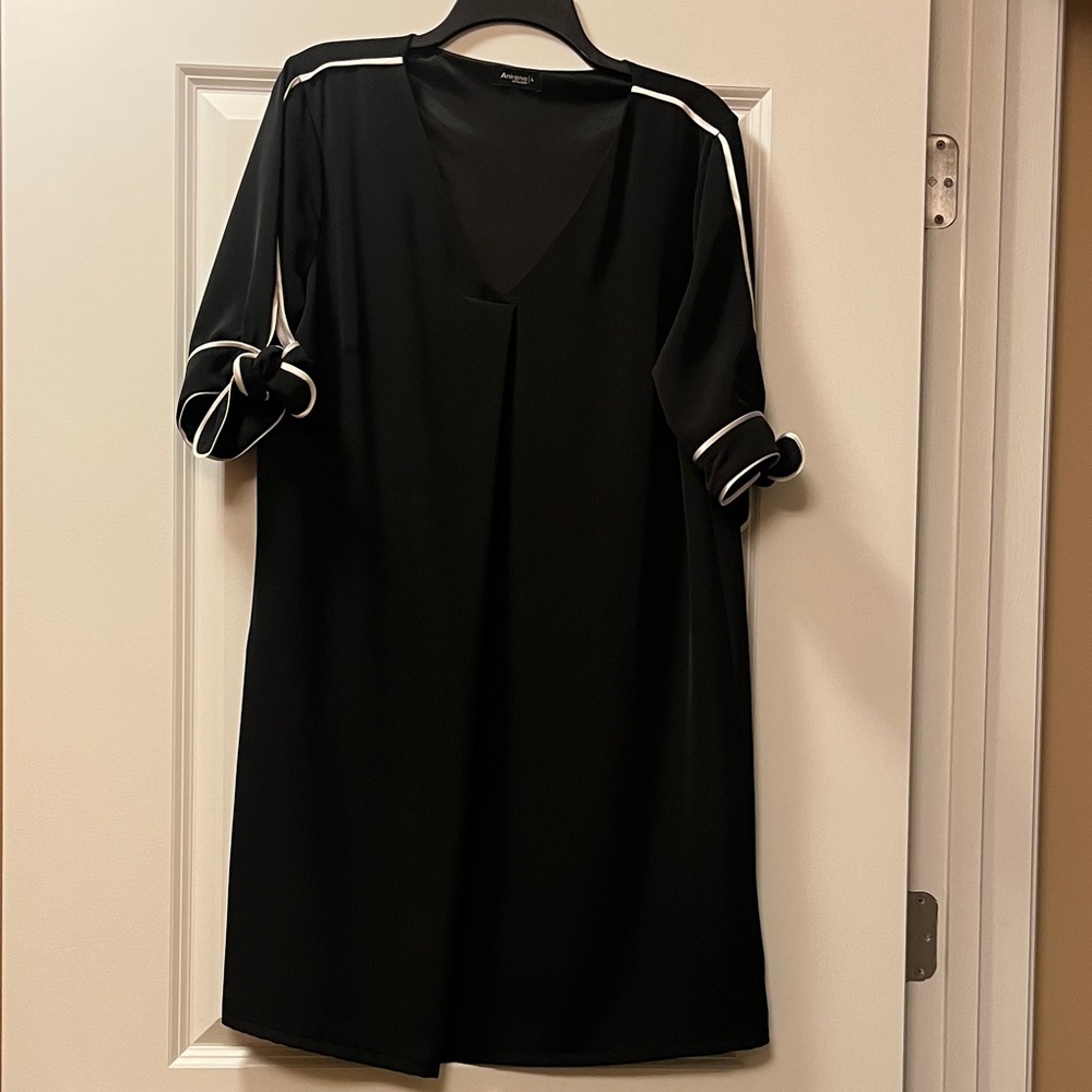 Chic Black Dress with White Trim